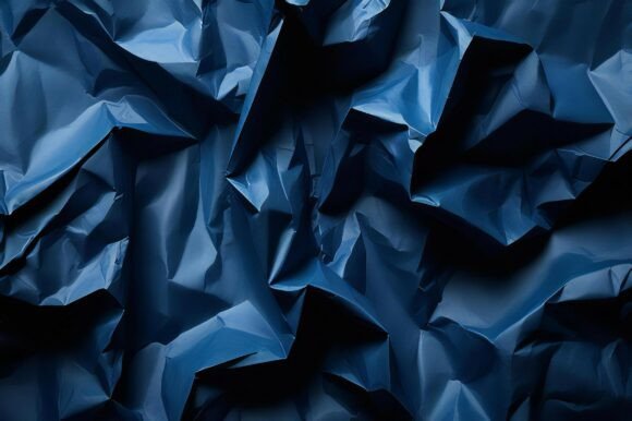 A Blue Crumpled Paper: A Unique Background for Creative Projects